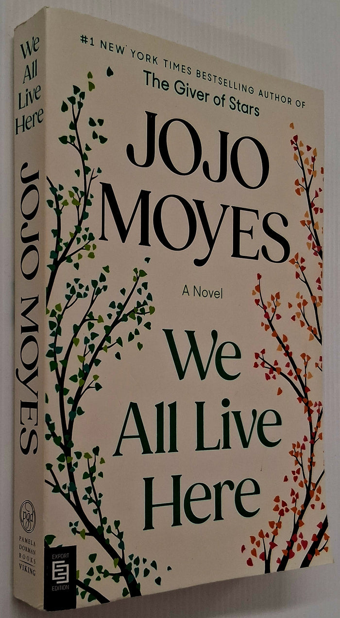 WE ALL LIVE HERE - Jojo Moyes